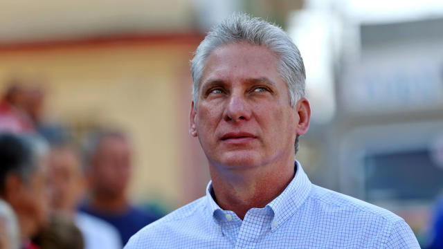 Cuba's then-First Vice-President Miguel Diaz-Canel stands in line before casting his vote during an election of candidates for the national and provincial assemblies, in Santa Clara, Cuba, March 11, 2018. 