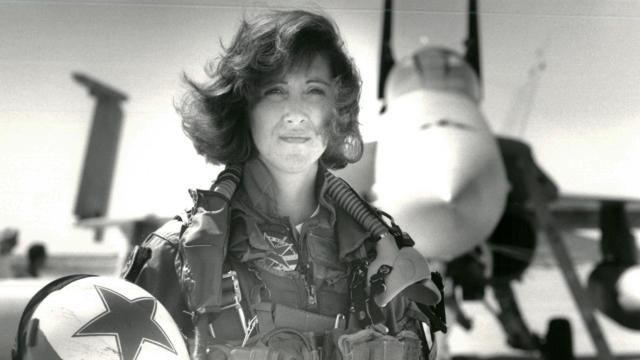 U.S. Navy Lt. Tammie Jo Shults poses in front of a Navy F/A-18A in this 1992 photo released in Washington April 18, 2018. 
