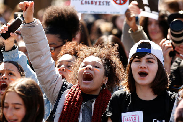 Youths take part in a national school walkout anti-gun march in Washington Square Park in the Manhattan borough of New York City April 20, 2018. 