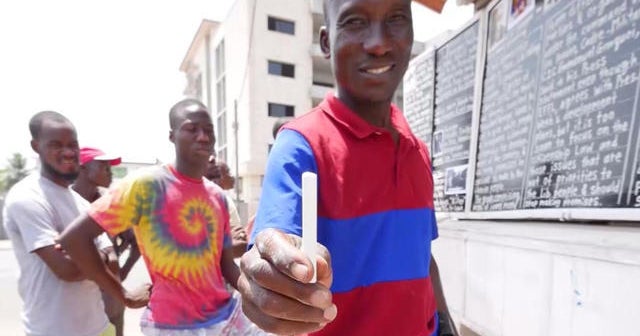 Delivering the news in Liberia via chalk