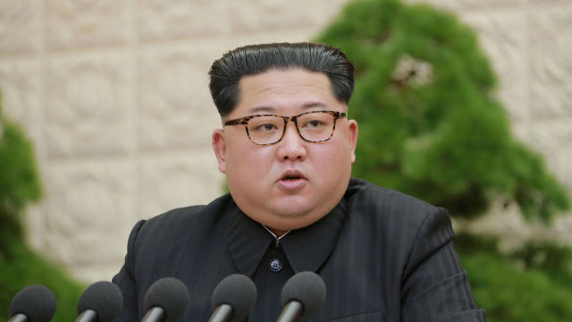 KCNA photo of North Korean leader Kim Jong Un speaking during the Third Plenary Meeting of the Seventh Central Committee of the Workers' Party of Korea 