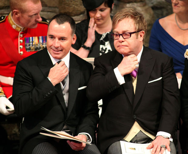 British artist Elton John (R) and his pa 