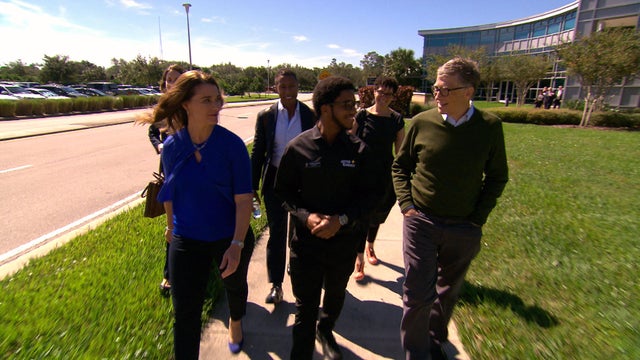 bill-melinda-gates-walk-with-ucf-staff.jpg 