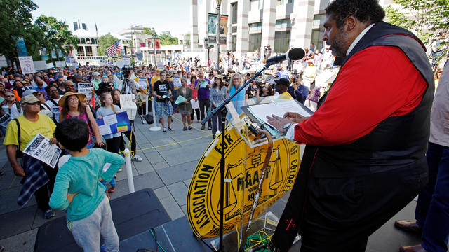 Reverend Doctor Barber II, president of the NAACP's North Carolina chapter and leader of the "Moral Monday" civil rights protests, speaks out against the state's HB2 "bathroom law" during a demonstration outside the state legislature in Raleigh 