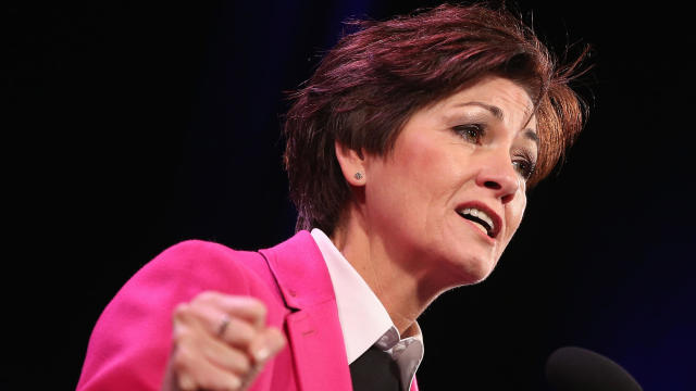 Iowa's then-Lt. Gov. Kim Reynolds speaks to guests at the Iowa Freedom Summit on Jan. 24, 2015, in Des Moines, Iowa. 