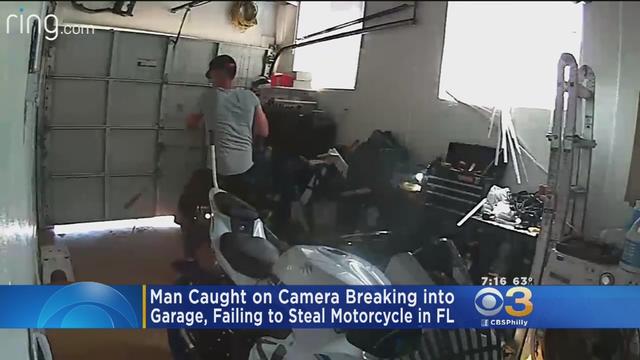 man-caught-on-camera-breaking-into-garage-failing-to-steal-motorcycle-in-fl.jpg 