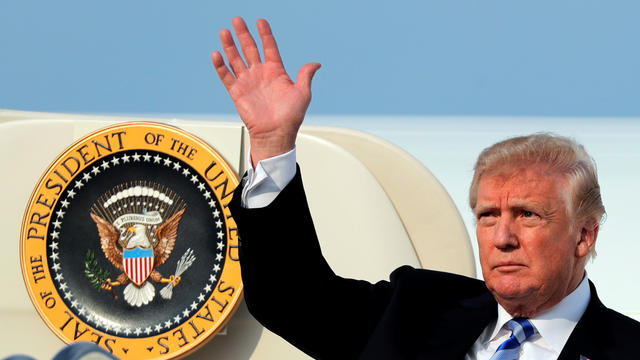 U.S. President Donald Trump waves as he arrives at Joint Base Andrews after attending the National Rifle Association (NRA) convention in Dallas, in Maryland, U.S. 