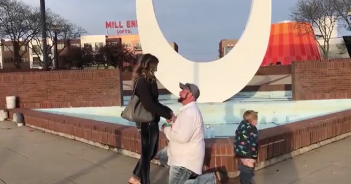 Son steals the show by going rogue in background of mom's proposal ...