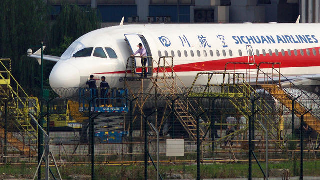 cbsn-fusion-sichuan-airlines-co-pilot-nearly-sucked-out-of-airplane-mid-flight-thumbnail-1568896-640x360.jpg 