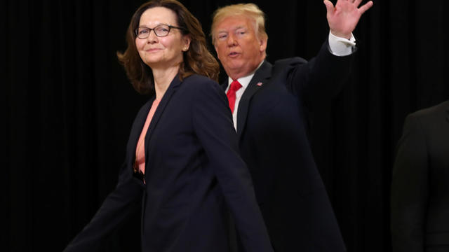 President Trump waves as he departs with new CIA Director Haspel after swearing in ceremonies 