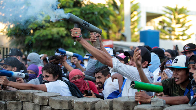 Demonstrators fire a homemade mortar during a protest against Nicaragua's President Daniel Ortega's government in Managua 