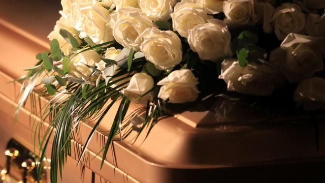 death-coffin-flowers-e1528210818207.jpg 