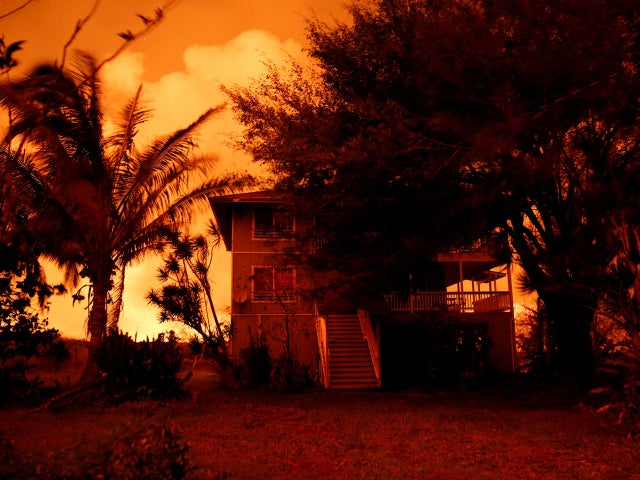 The Wider Image: Cut off by lava, pot growers refuse to let go dream 