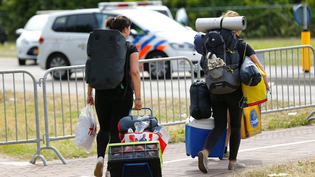 Dutch policeman behind plastic tape 