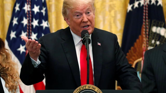 U.S. President Donald Trump holds a news conference to mark six months since the passage of the Tax Cuts and Jobs Act, in the White House East Room in Washington 