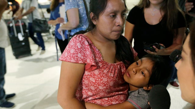 Buena Ventura Martin Godinez, left, hugs her daughter Janne after being reunited at Miami International Airport July 1, 2018, in Miami. 