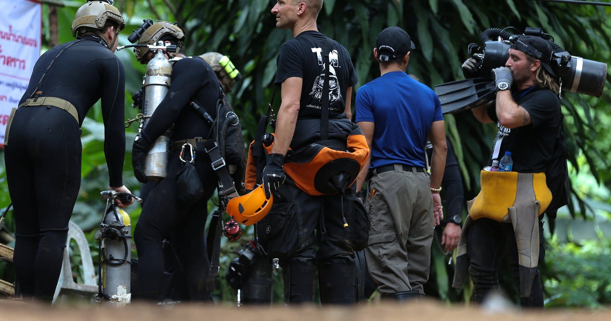 Thailand cave rescue: Soccer team still trapped as rescuers pump water ...