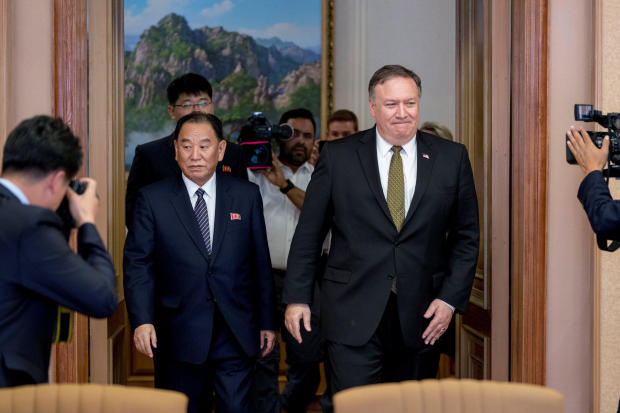 U.S. Secretary of State Mike Pompeo and Kim Yong Chol, a North Korean senior ruling party official and former intelligence chief, return to discussions after a break at Park Hwa Guest House in Pyongyang 