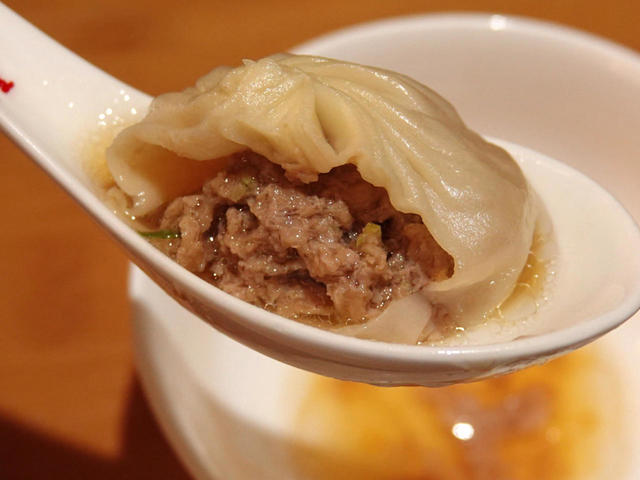 Spicy Soup Dumplings. When you take the first bite, the soup inside will  flow out. Soak up the soup before eating the dumplings. Isn't it  interesting to eat soup dumplings? And it's