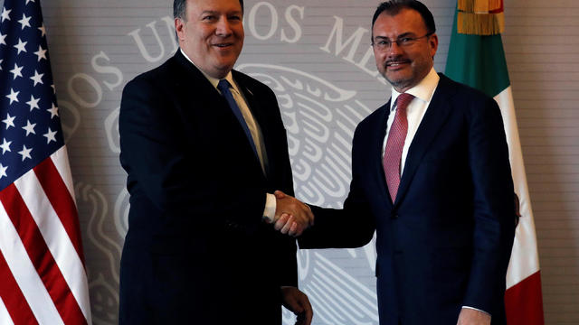 U.S. Secretary of State Mike Pompeo and Mexico's Foreign Minister Luis Videgaray shake hands after delivering a joint statement in Mexico City 