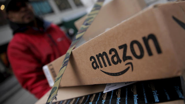 FILE PHOTO: Amazon boxes are seen stacked for delivery in Manhattan 