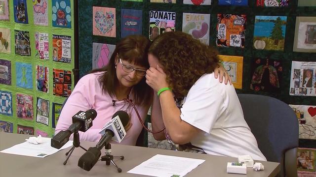 Lauren Santoro, right, and Vicky, who received the heart of Santoro's 14-year-old daughter, embrace on July 20, 2018. 