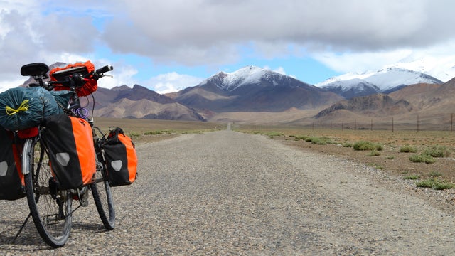 Long distance cycling on M41 Pamir Highway, Pamir Mountain Range, Tajikistan 