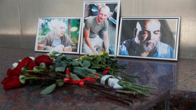Photographs of journalists Dzhemal, Radchenko and Rastorguyev recently killed in Central African Republic are on display in Moscow 