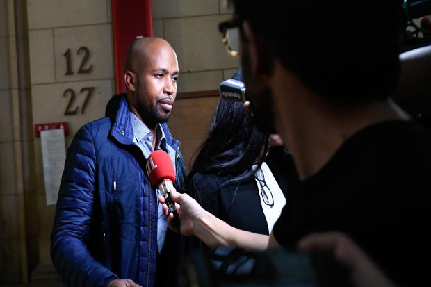 French rapper Rohff speaks to the media before his trial at a Paris courthouse on Sept. 29, 2017. The 39-year-old artist, whose real name is Housni Mkouboi, appeared before the Paris Criminal Court on a charge of aggravated violence stemming from an April 2014 incident in the Parisian shop of his rival, French rapper Booba. 