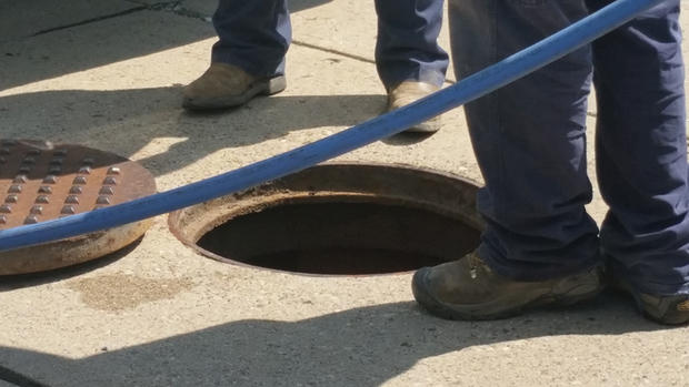 baldwin man stuck in sewer 