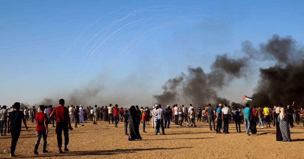 Violence erupts amid Gaza cease-fire; 2 Palestinians killed - CBS News