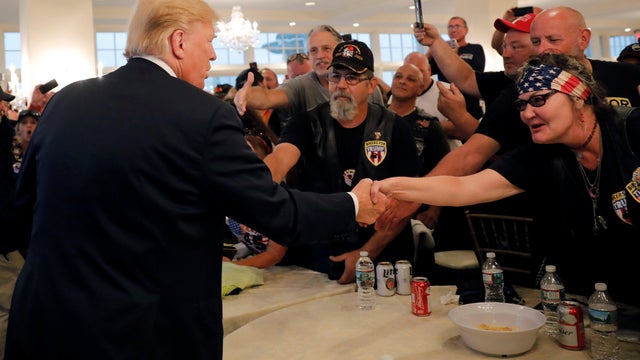 U.S. President Donald Trump meets with supporters from a group called "Bikers for Trump" at the Trump National Golf Club in Bedminster 