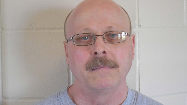 Carey Dean Moore, 60, appears in a police booking photo released in Lincoln, Nebraska 