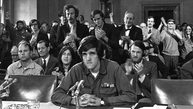 John Kerry, 27, testifies about the war in Vietnam before the Senate Foreign Relations Committee in Washington, April 22, 1971. Sen. Kerry, D-Mass., 63, became a prominent critic of the war after he came home as a decorated veteran, famously asking lawmakers at the hearing: "How do you ask a man to be the last man to die for a mistake?" Kerry opposes sending additional troops into Iraq. (AP Photo/Henry Griffin) 