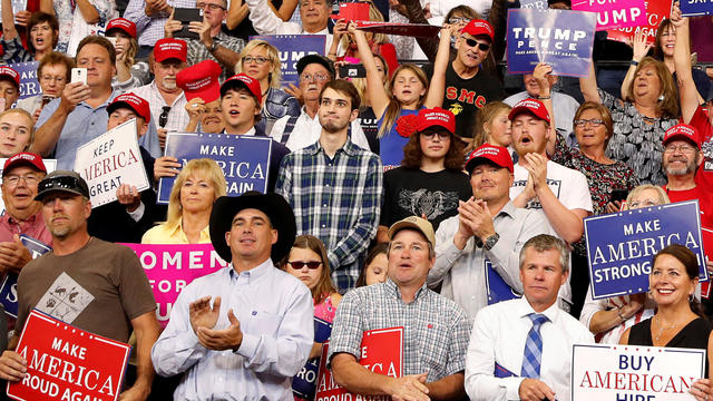 Unidentified man in a plaid shirt goes viral with his reactions to President Trump during a rally in Montana 
