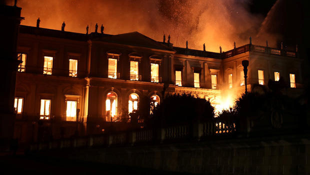 Firefighters try to extinguish a fire at the National Museum of Brazil in Rio de Janeiro 