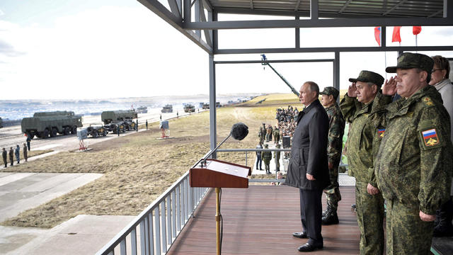 Russian President Vladimir Putin, Chinese Defence Minister Wei Fenghe, Defence Minister Sergei Shoigu and Chief of the General Staff of Russian Armed Forces Valery Gerasimov watch the military parade during Vostok-2018 war games at Tsugol military trainin 