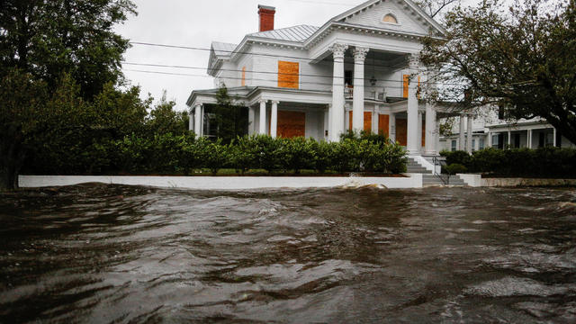 Water from the Neuse river floods houses during the passing of Hurricane Florence in the town of New Bern 