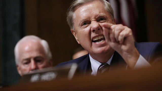Senate Judiciary Committee member Sen. Lindsey Graham (R-SC) shouts while questioning Judge Brett Kavanaugh during his Supreme Court confirmation hearing in the Dirksen Senate Office Building on Capitol Hill in Washington 