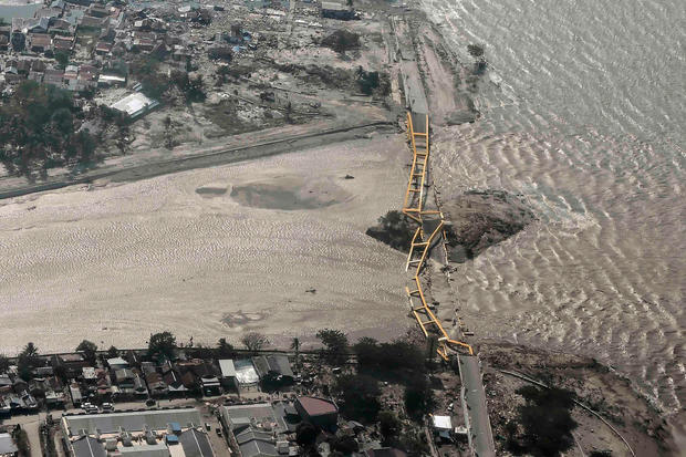 Aerial view of bridge damaged by an earthquake and tsunami in Palu, Central Sulawesi 