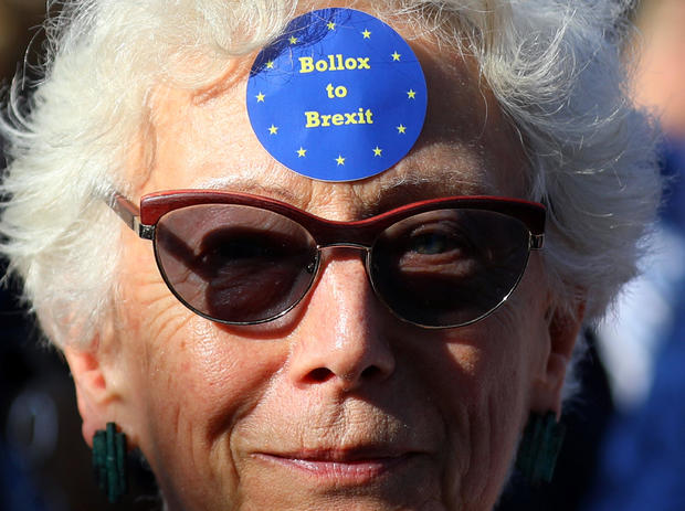 Protesters participating in an anti-Brexit demonstration march through central London 