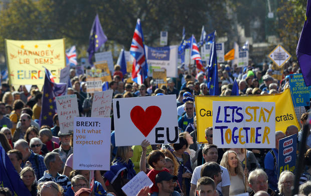 Protesters participating in an anti-Brexit demonstration march through central London 