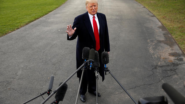 U.S. President Donald Trump speaks to the media as he departs for a campaign rally in Fort Myers, Florida, on the South Lawn of the White House in Washington 