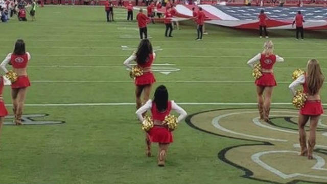 cheer-49ers-kneel.jpg 