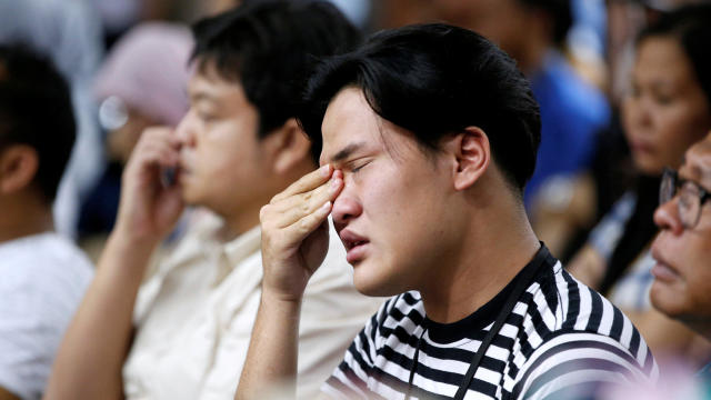 A man who had family on the crashed Lion Air flight cries as he attends a news conference about the recovery process at a hotel in Jakarta, Indonesia, Nov. 5, 2018. 