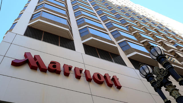FILE PHOTO: A Marriott flag hangs at the entrance of the New York Marriott Downtown hotel in Manhattan, New York 