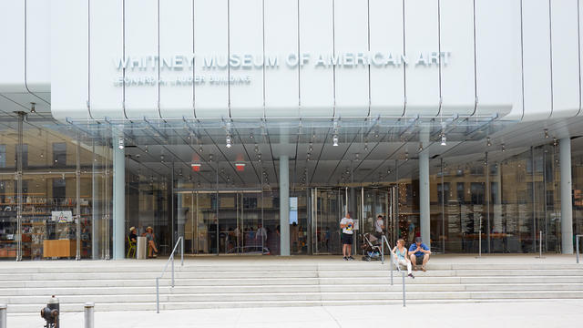 Whitney Museum of American Art facade with people in New York 