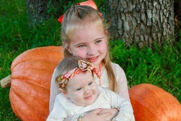 Codie Rae Sackett, 5, and her younger sister, 8-month old Charli Ann Sackett  