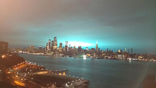 Night sky over New York turns blue after electrical fault at Queens Con  Edison power plant causes 'arc flash
