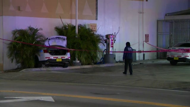 police-car-into-building-raw.jpg 